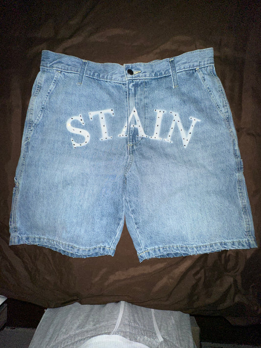 Stain “Bustdown” denim shorts